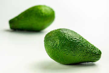 Ripe Green Avocado on a white background