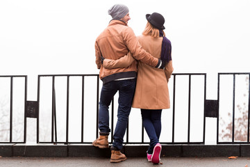 Couple outdoors  enjoying nice autumn / winter time.