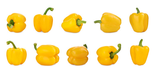Set of ripe yellow bell peppers on white background
