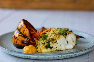 Cod loin in almond crust with pumpkin and fennel