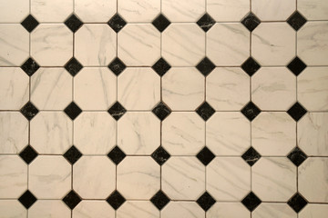 Surface white Marble floor tiles with multiply cross or X on the floor - Texture Background patterns 