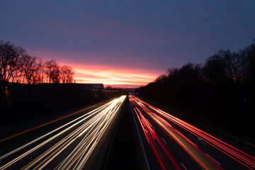 Fototapeta na wymiar highway at dawn, Autobahn A 555 near Bonn, Germany, three lines