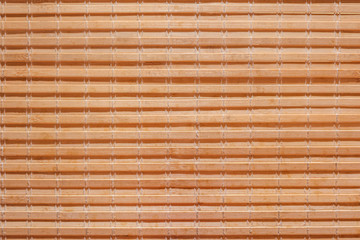 Closeup tropical bamboo curtain in Japanese restaurant. Abstract texture wallpaper.