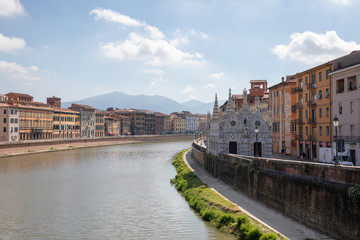 Fototapeta premium Panoramic view on historic center of Pisa city and river Arno
