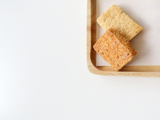 Crispy Bread Butter Sugar on wooden tray.