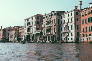 Fototapeta na wymiar Panoramic view of Grand Canal (Canal Grande) with active traffic gondolas