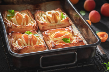 Juicy puff pastry made of fresh peaches and sugar