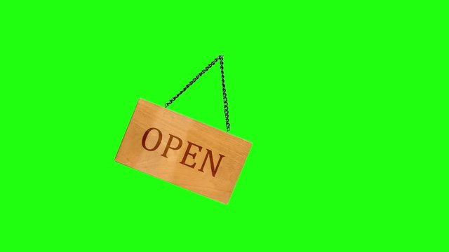vintage wooden text open sign isolate on green screen background.