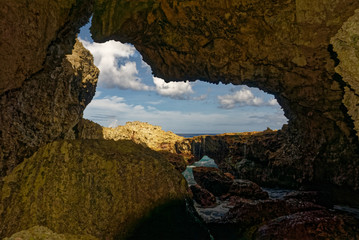 A cave opens out onto the sea in Niue