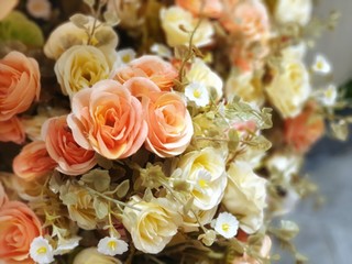 Fake flowers  for interior.Artificial roses made by fabric and plastic use decorated.14 February is Valentine day. love wallpaper