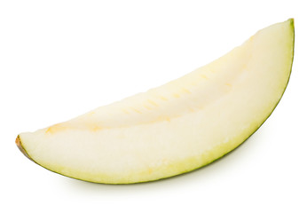 Slice of ripe yellow melon isolated on a white.
