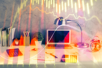 Multi exposure of chart and financial info and work space with computer background. Concept of...