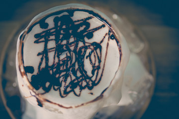 Dirty glass with milk and sauce chocolate