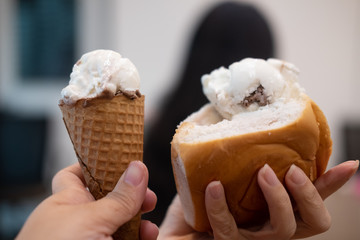 Ice cream on cone and ice cream in bread the fresh coconut milk in hand
