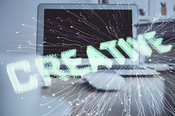 Desktop computer background in office and start up theme hologram drawing. Double exposure. Startup...