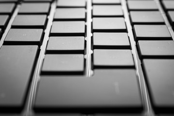 Laptop keyboard with selective focus and soft bokeh