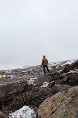 Obraz premium man on top of mountain