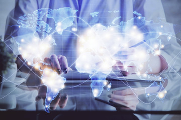 International business hud over woman's hands writing background. Concept of hard work. Double...