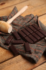 melting chocolate tablet in color background