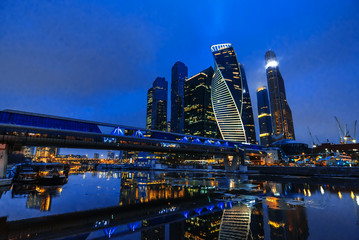 Fototapeta premium City view landscape on the towers of skyscrapers Moscow city and Bagration bridge by the river
