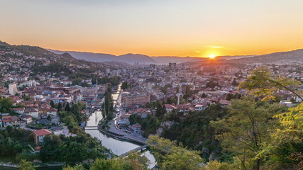 Fototapeta na wymiar Sunset view of Sarajevo from most popular panoramic spot in Sarajevo timelapse.