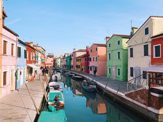 BURANO, ITALY - JANUARY 20, 2020: Colorful houses on the island of Burano in Italy. Burano island is famous for its colorful fisherman's houses..
