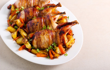 Roast Quails wrapped in bacon