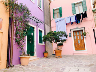 BURANO, ITALY - JANUARY 20, 2020: Colorful houses on the island of Burano in Italy. Burano island is famous for its colorful fisherman's houses..
