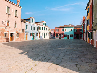 BURANO, ITALY - JANUARY 20, 2020: Colorful houses on the island of Burano in Italy. Burano island is famous for its colorful fisherman's houses..