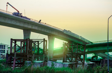 Construction site of road bridge with sunset sky