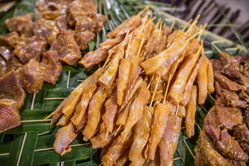 Barbecue salmon fish on skewers