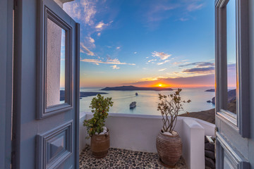 Amazing evening view of Santorini island. Picturesque spring sunset on the famous Greek resort...