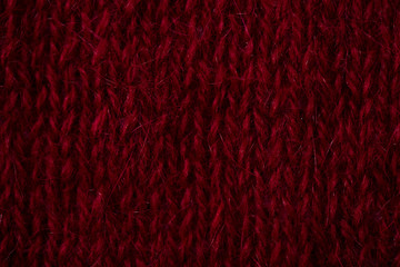 Maroon Knitted Fabric Texture. fashion burgundy background  