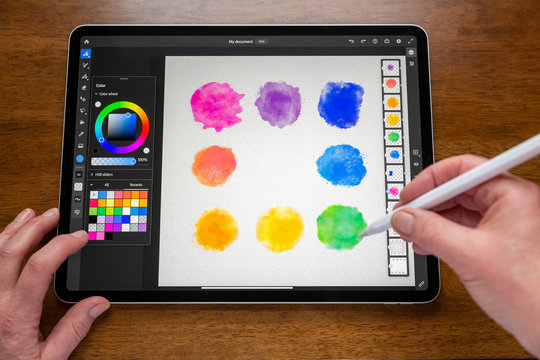 BATH, UK - FEBRUARY 15, 2020: Adobe Fresco application being used to create a digital watercolour painting on an Apple iPad Pro.