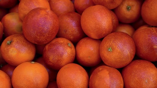 Organic fresh  sicilian oranges sold by vendors in a farmer's market in Piazza Verga, Catania, Sicily