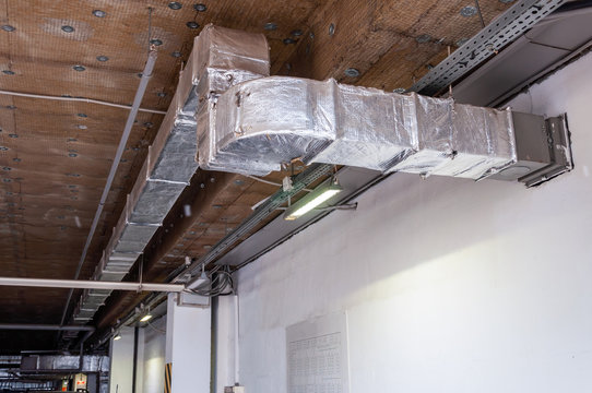 Equipment for ventilation and ceiling insulation systems in the Parking lot in a modern building