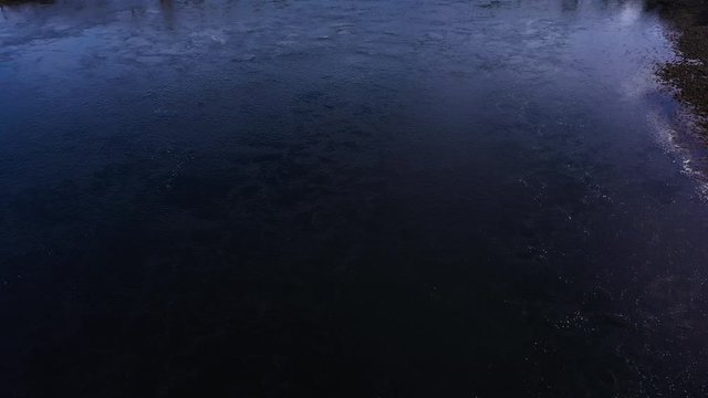 aerial drone footage of winter in glencoe and and loch linnhe in the argyll region of the highlands of scotland showing clear bright white snow on the mountains of glencoe and the surrounding region