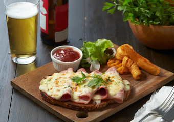 Ham topping with Amercian cheese serve with mixed fried potato