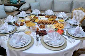 Moroccan breakfast for Ramadan. Dates, sweets and hard-boiled eggs. Breakfast is served in Ramadan after Maghrib