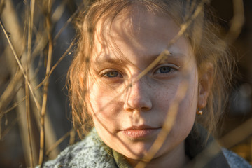 Portrait of a little, young cute smiling girl, close-up