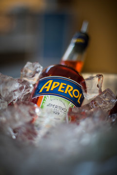 Illustrative editorial image of an Aperol bottle in an ice bucke