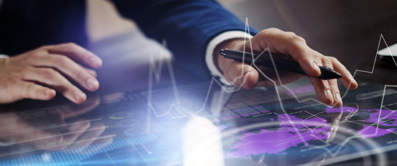 Man working on progect using high technology tablet