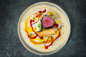 Filet mignon Beef steak with mushrooms and vegetables on a plate, food styling for serving in a restaurant
