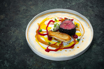 Filet mignon Beef steak with mushrooms and vegetables on a plate, food styling for serving in a...