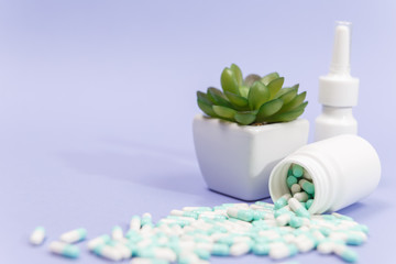 Pills spilling out of pill bottle. Pharmaceutical industry. Pharmacy.