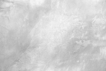 Raw old cement or concrete or plaster wall with stains for background and texture.