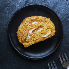 biscuit cake roll (delicious sweet honey dessert) menu concept. background. top view. copy space