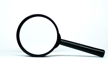 The magnifying glass is isolated on a white background. Magnifier as a template for design. Black...