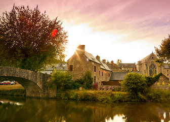 Image of the canal and bridge at sunset at Lehon, Brittany France
