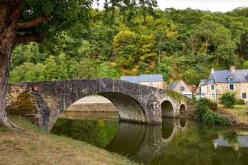 Fototapeta premium Image of stone bridge at Lehon, Brittany, France